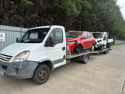 A damaged hatchback and a tipper truck on one run — Roadsist Auto, North Lanarkshire