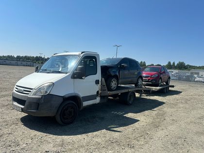 Collision-damaged SUV collected on a clear summer day — Roadsist Auto, North Lanarkshire
