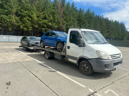 A trade movement of two cars leaving Cleland — Roadsist Auto, North Lanarkshire